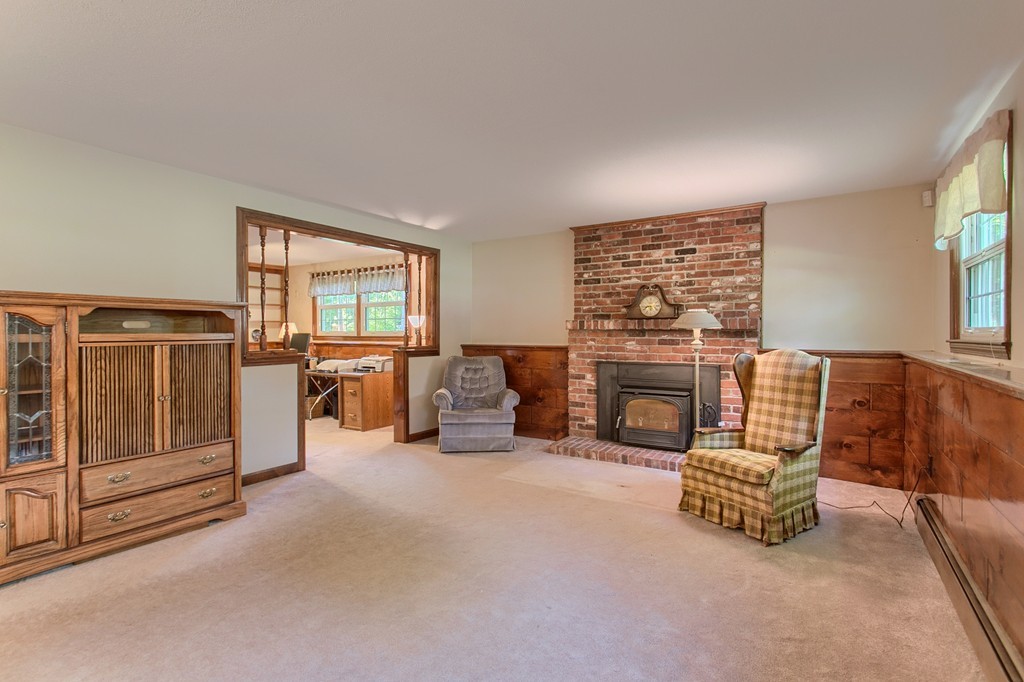 24 Newton Road Westminster, MA 01473 - Photo 11 of 30 a living room with furniture and a fireplace