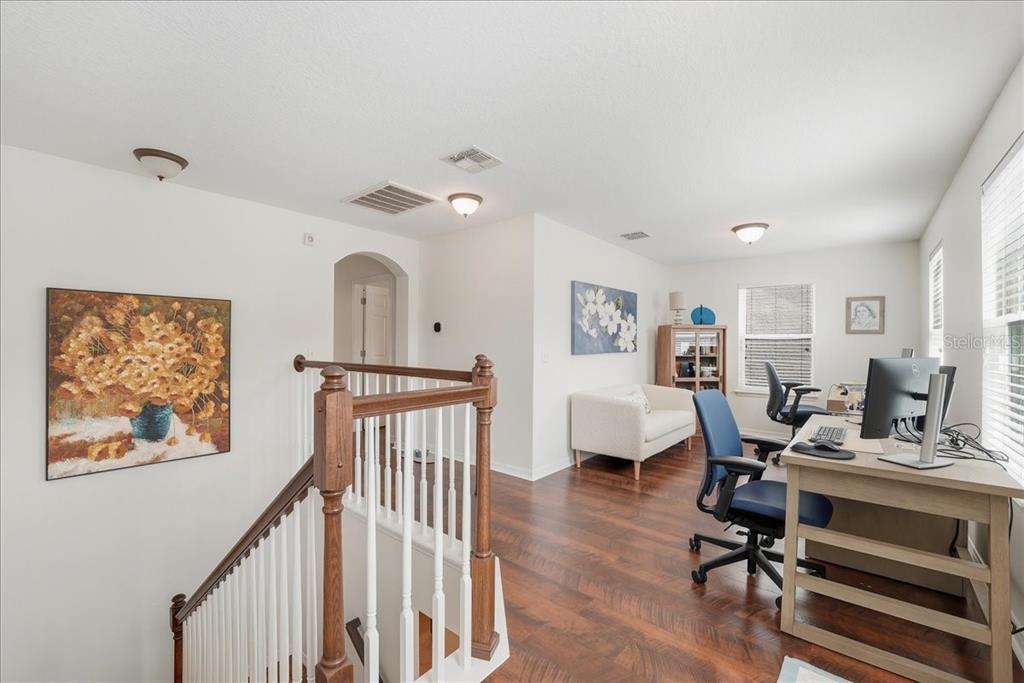 11675 Snail Kite Way Windermere, FL 34786 - Photo 27 of 46 a workspace with wooden floor