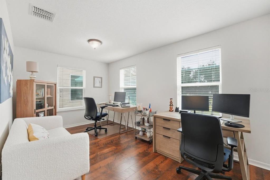 11675 Snail Kite Way Windermere, FL 34786 - Photo 28 of 46 a view of a livingroom with workspace and a window