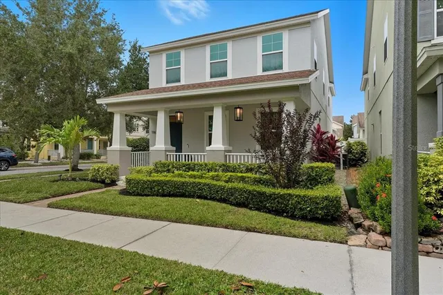 front view of a house with a yard