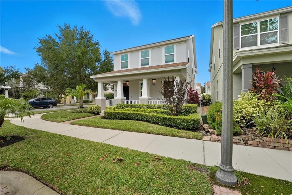 11675 Snail Kite Way Windermere, FL 34786 - Photo 46 of 46 a front view of a house with a yard