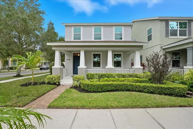 front view of a house with a yard