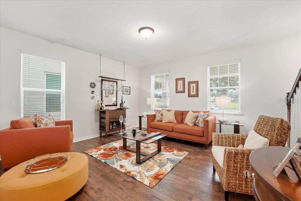 11675 Snail Kite Way Windermere, FL 34786 - Photo 10 of 46 a living room with furniture and a window