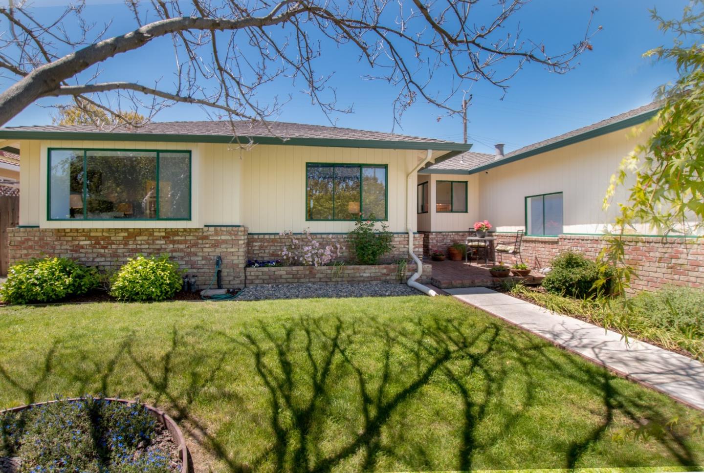 754 Ridge Rd. Santa Clara, CA 95051 - Photo 3 of 25 a front view of a house with garden