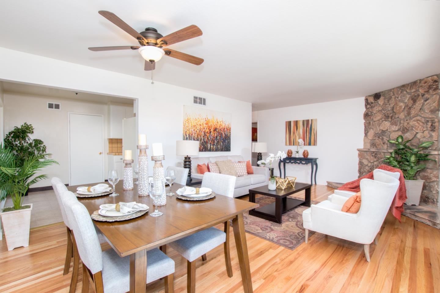 754 Ridge Rd. Santa Clara, CA 95051 - Photo 6 of 25 a living room with furniture kitchen view and a large window