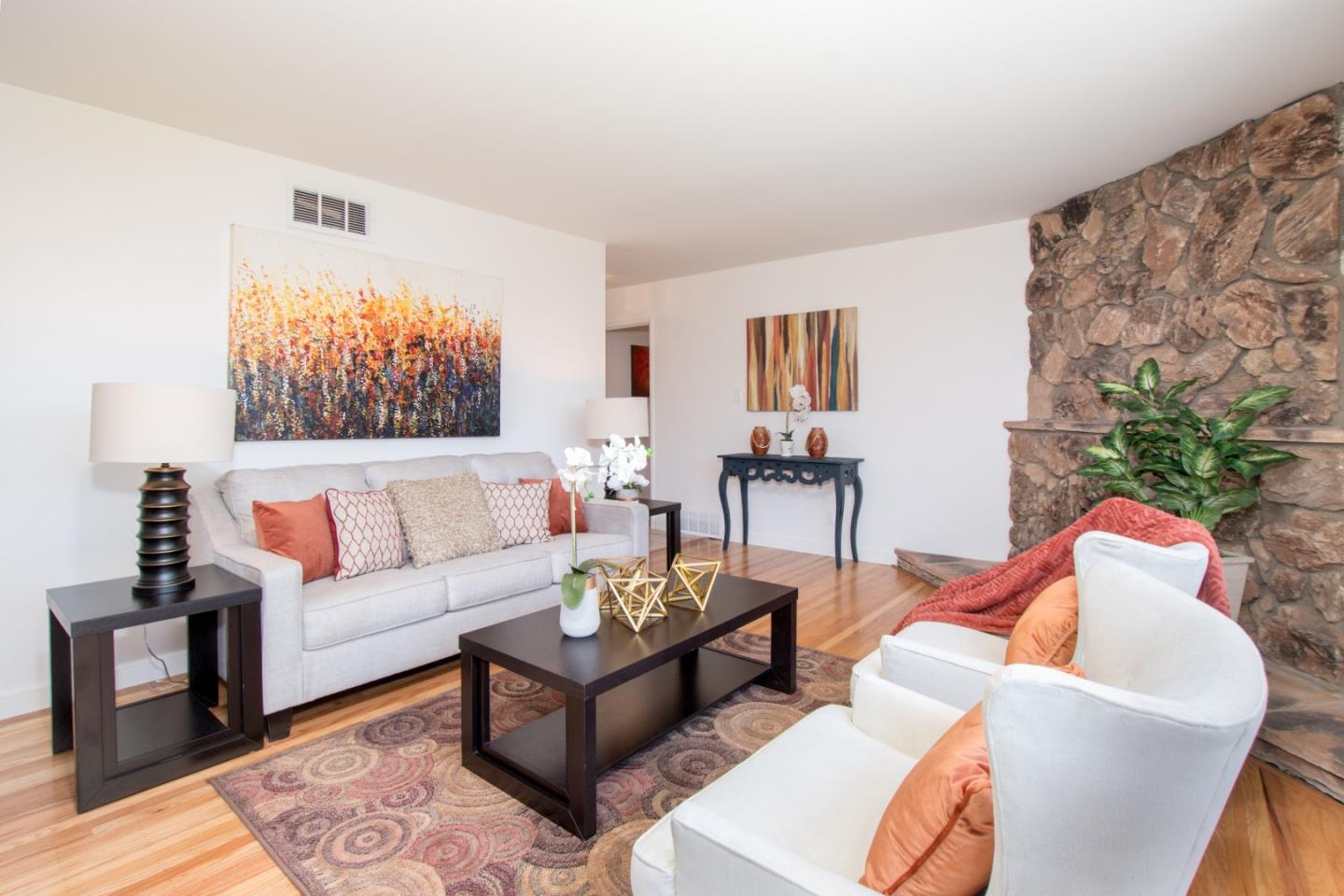 754 Ridge Rd. Santa Clara, CA 95051 - Photo 7 of 25 a living room with furniture and a flat screen tv