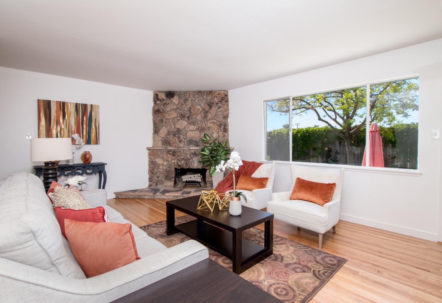 754 Ridge Rd. Santa Clara, CA 95051 - Photo 8 of 25 a living room with furniture and a floor to ceiling window