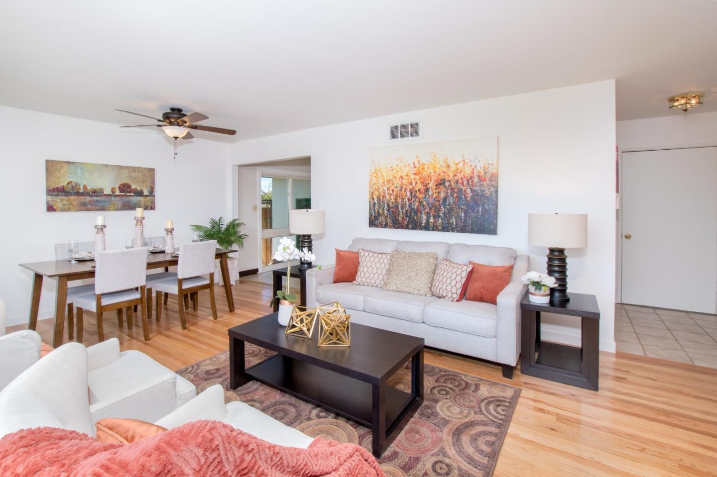 754 Ridge Rd. Santa Clara, CA 95051 - Photo 9 of 25 a living room with furniture a rug and a window