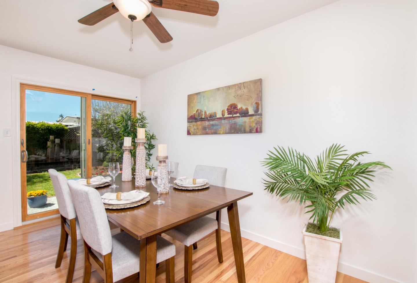 754 Ridge Rd. Santa Clara, CA 95051 - Photo 10 of 25 a view of a dining room with furniture window and wooden floor