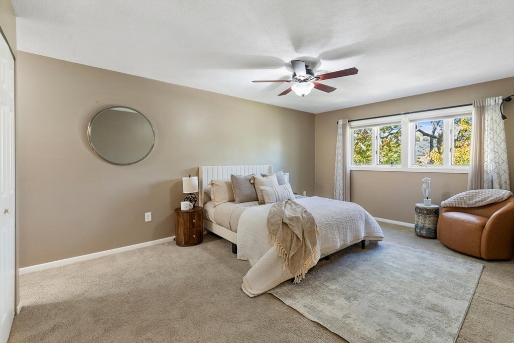 1100 Salem Street, Unit 58 Peabody, MA 01960 - Photo 18 of 36 a bed room with bed and window