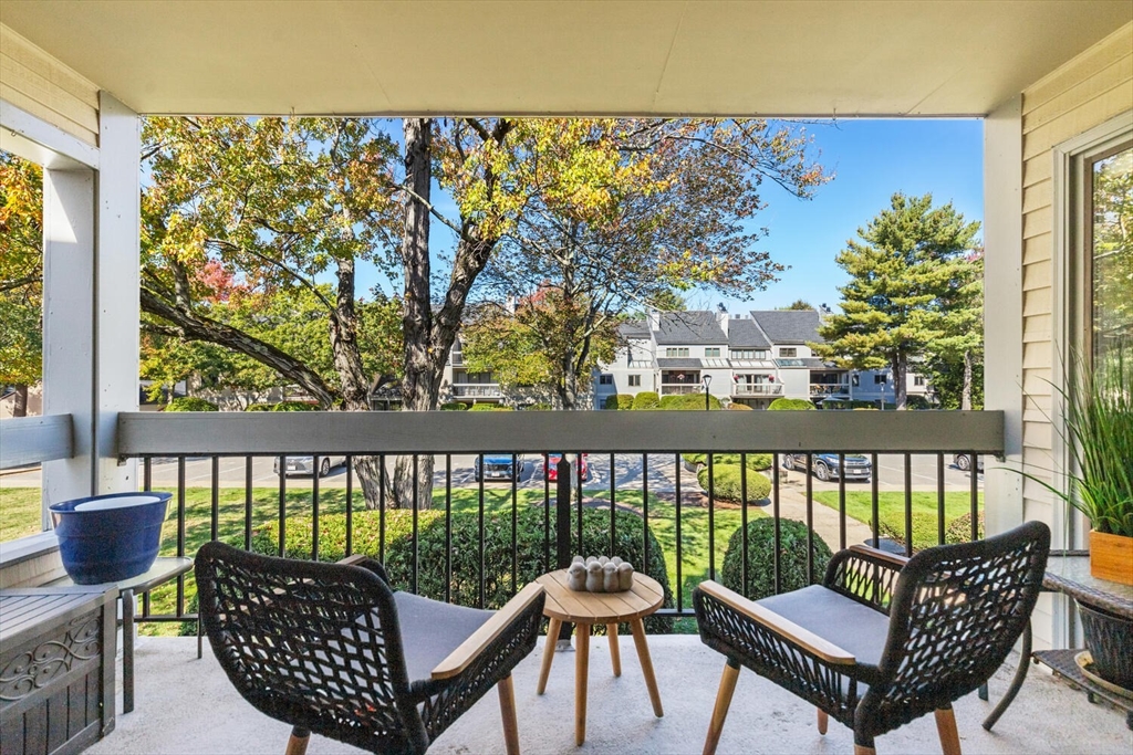 1100 Salem Street, Unit 58 Peabody, MA 01960 - Photo 28 of 36 a view of a chairs and table in patio