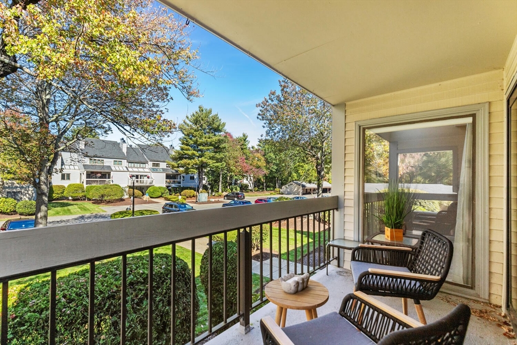 1100 Salem Street, Unit 58 Peabody, MA 01960 - Photo 29 of 36 a view of a chairs and table in patio
