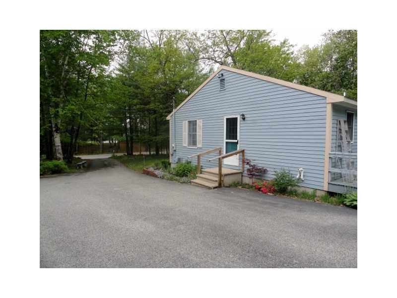 327 Webber Road North Waterboro, ME 04061 - Photo 4 of 25 Exterior Back. Paved driveway at...