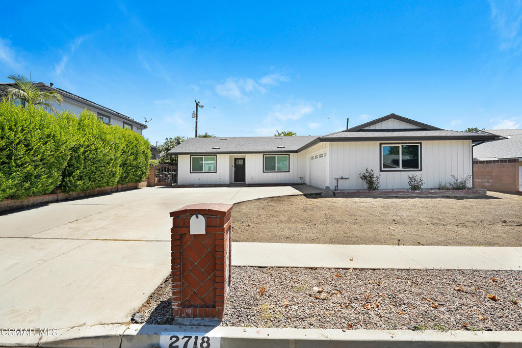 2718 Licia Place Simi Valley, CA 93065 - Photo 1 of 22 a front view of a house with a yard