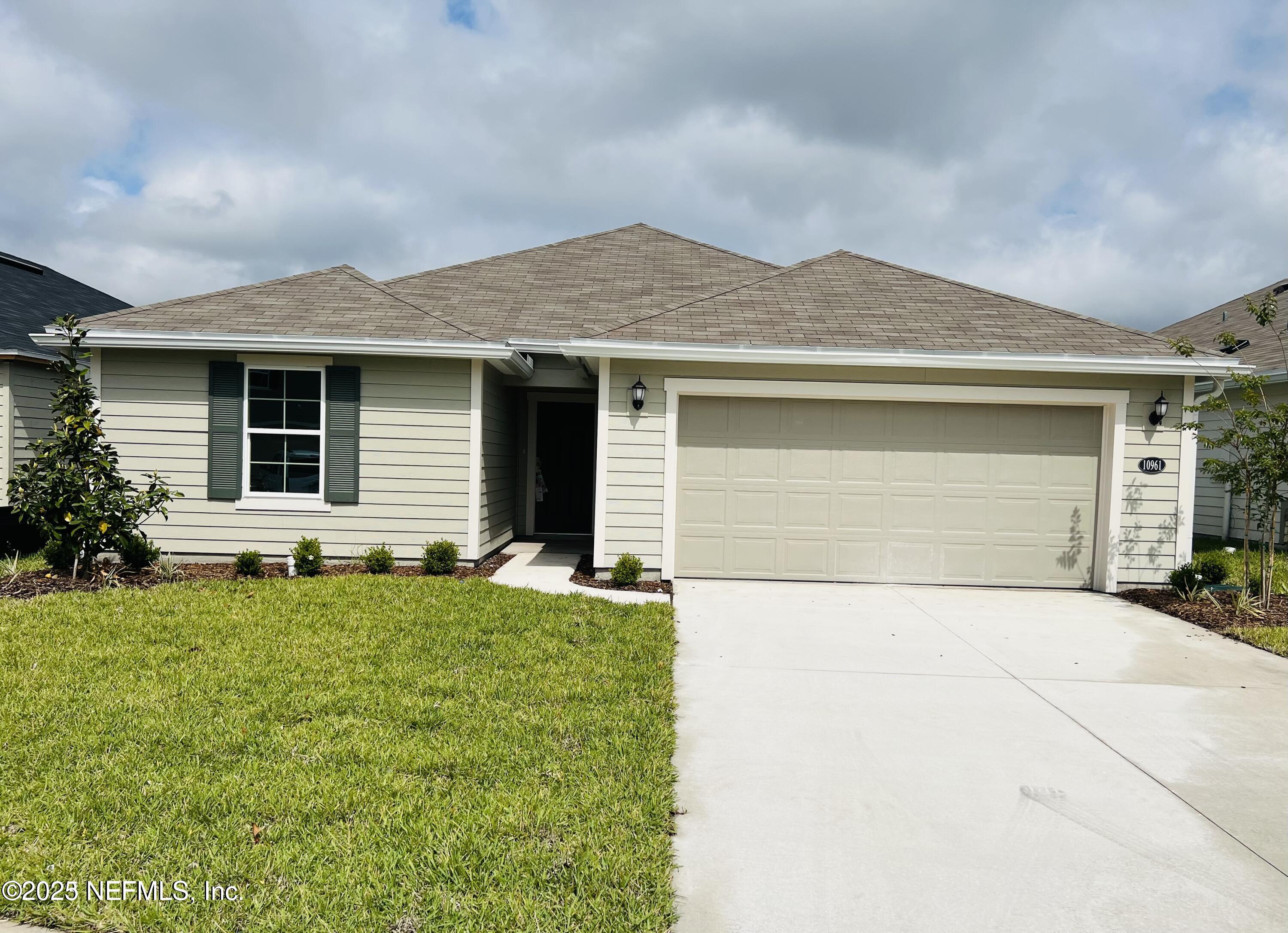 a front view of house with yard