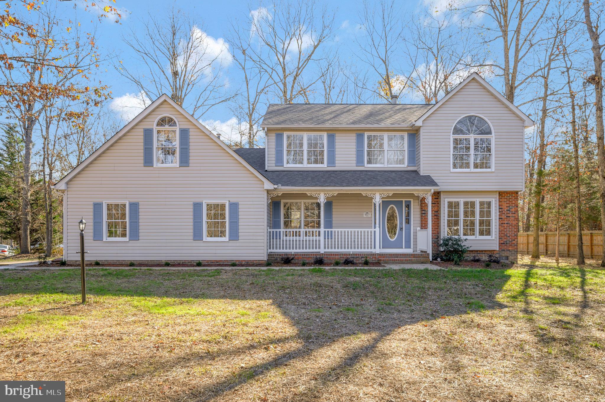10511 Holleybrooke Drive Spotsylvania, VA 22553 - Photo 1 of 59 a front view of a house with a yard