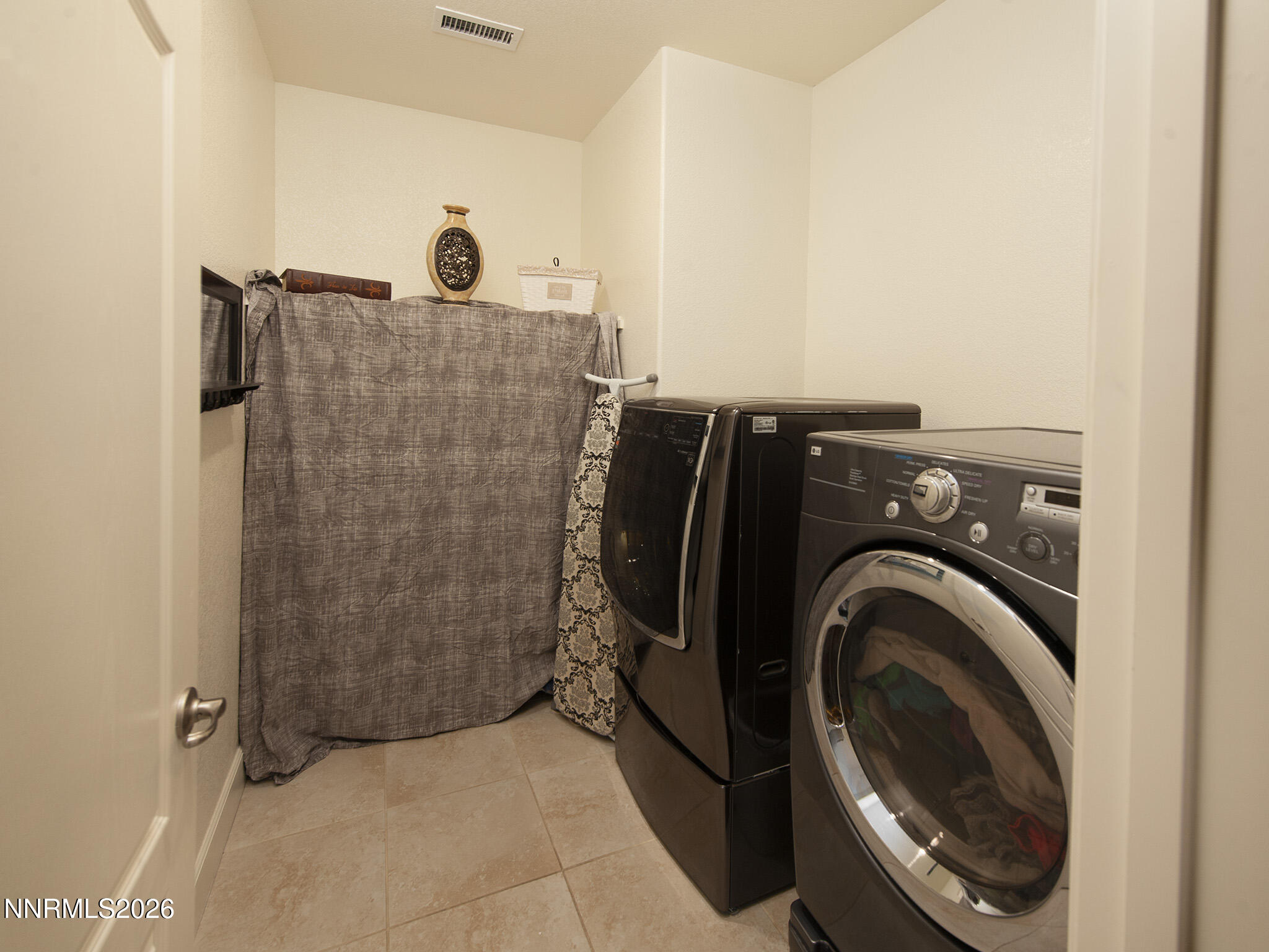 9766 Pachuca Drive Reno, NV 89521 - Photo 42 of 59 a view of walk in closet with clothes and shoes