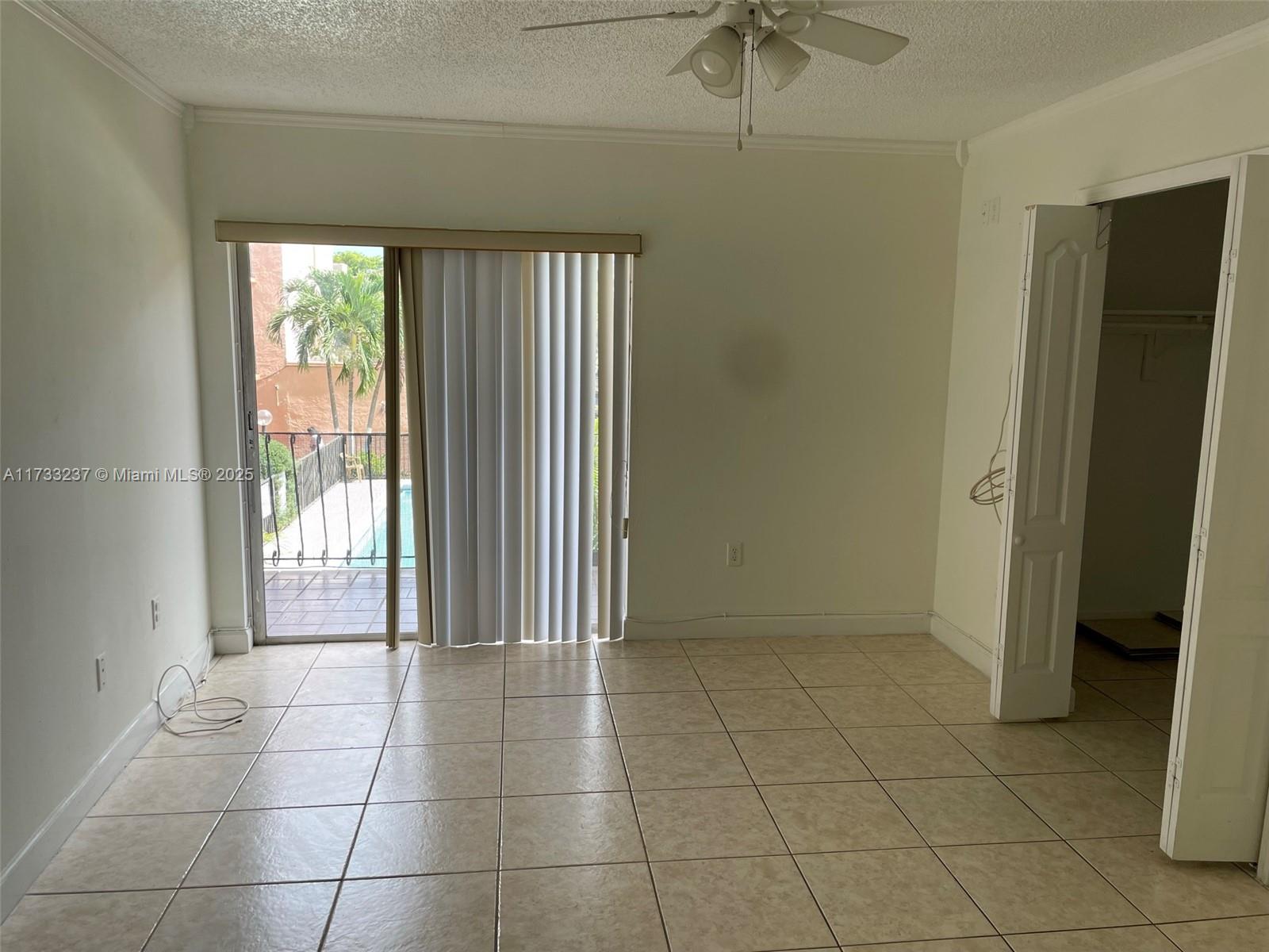 1950 West 54th Street, Unit 112 Hialeah, FL 33012 - Photo 18 of 27 a view of an empty room with a window