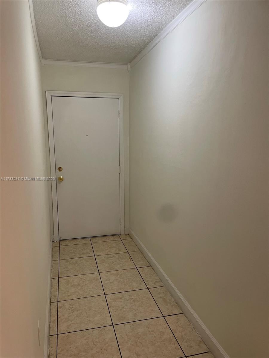 1950 West 54th Street, Unit 112 Hialeah, FL 33012 - Photo 22 of 27 a view of an empty room