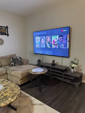 a view of a workspace with furniture