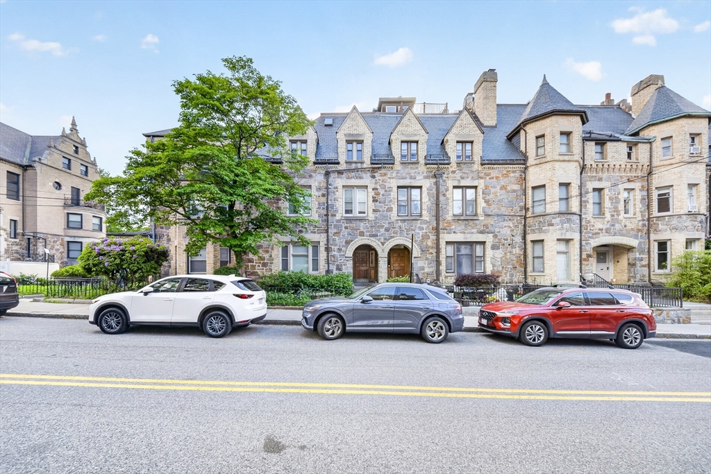 352 Tappan Street, Unit 1 Brookline, MA 02445 - Photo 30 of 42 a cars parked in front of a building