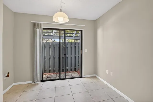 a view of a bathroom with a sink and a mirror