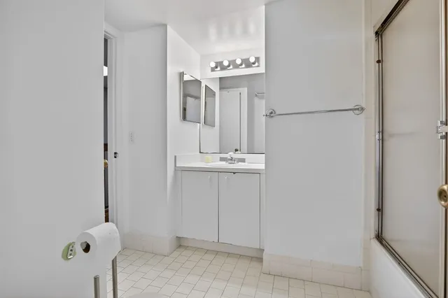 a view of balcony with wooden floor