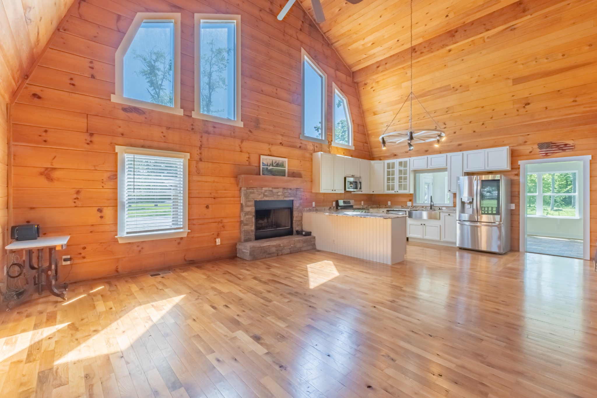 959 Ferrells Loop Road Manchester, TN 37355 - Photo 14 of 55 a view of a building with barbeque and wooden floor