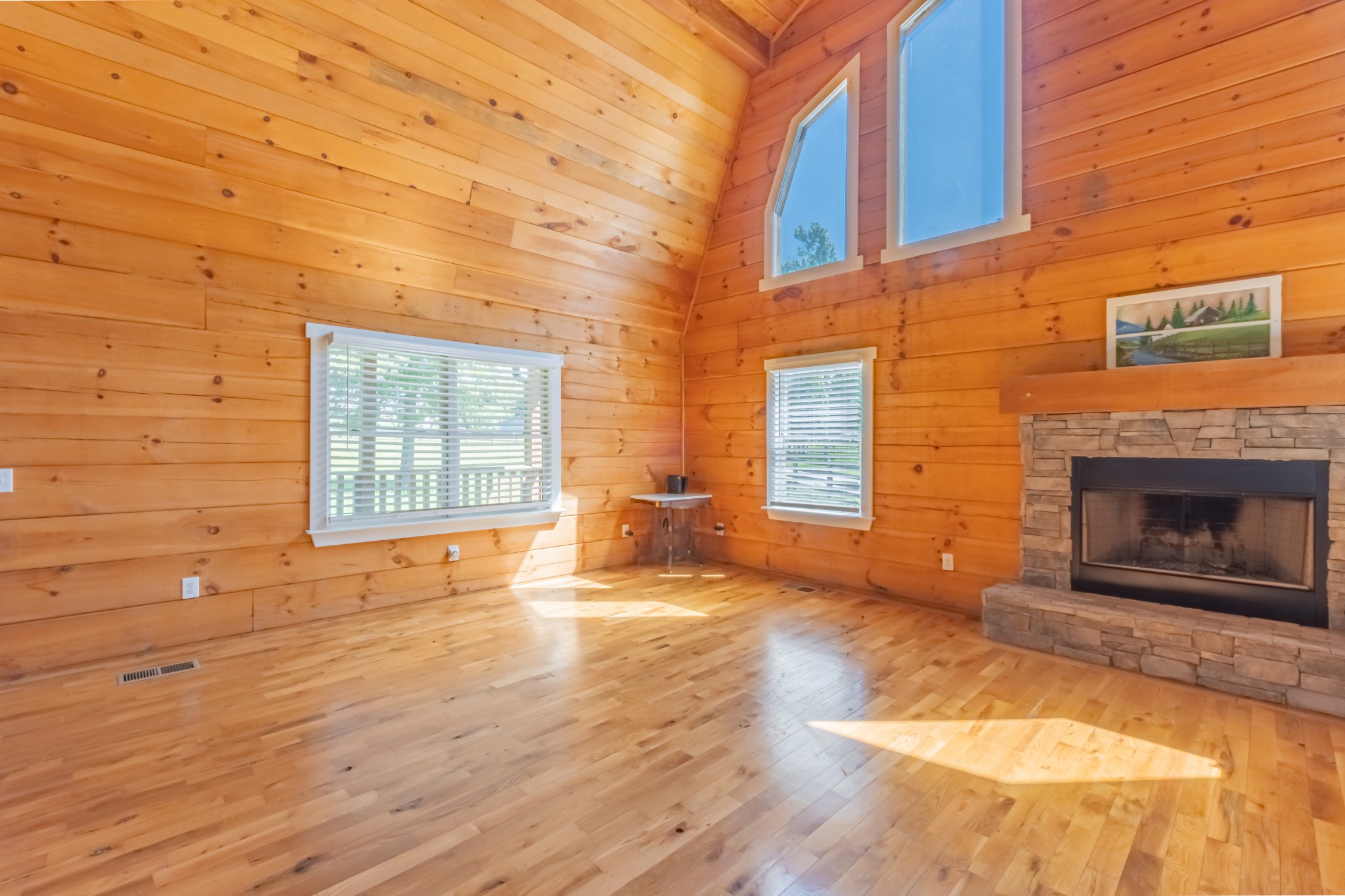 959 Ferrells Loop Road Manchester, TN 37355 - Photo 15 of 55 a view of an empty room with a fireplace and a window