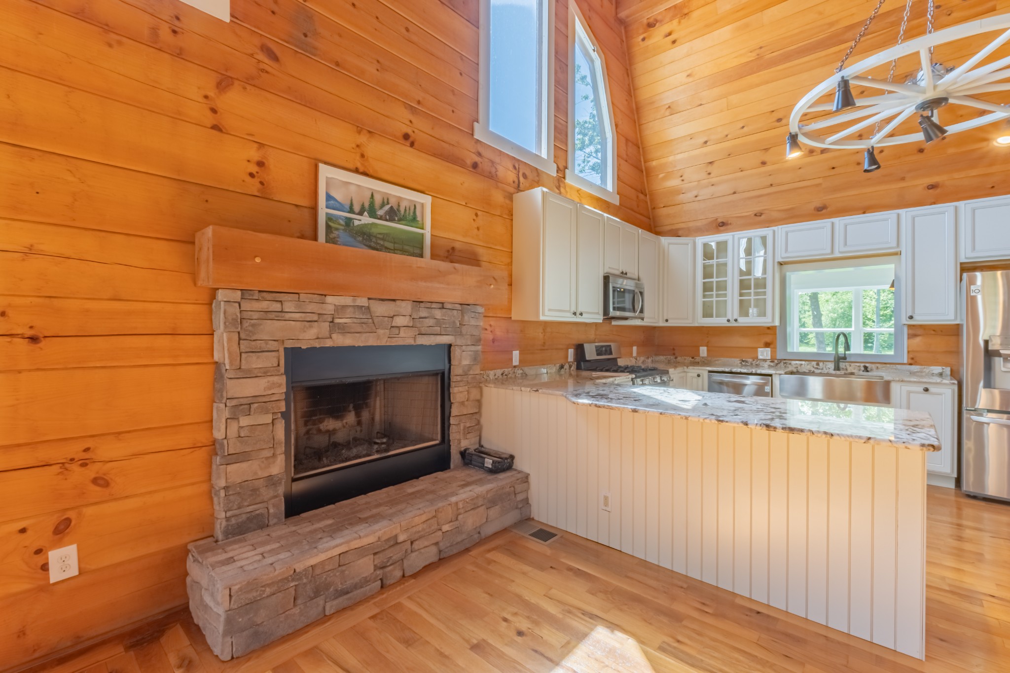 959 Ferrells Loop Road Manchester, TN 37355 - Photo 16 of 55 a kitchen with stainless steel appliances granite countertop a stove a sink and a refrigerator