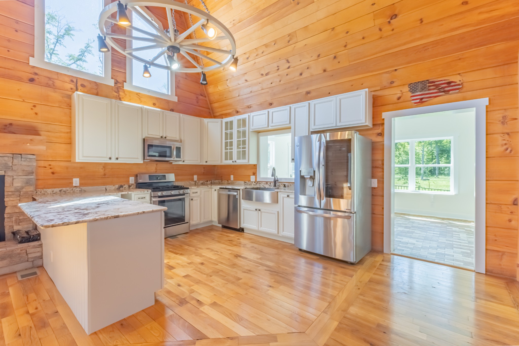 959 Ferrells Loop Road Manchester, TN 37355 - Photo 18 of 55 a kitchen with stainless steel appliances granite countertop a refrigerator a stove top oven a sink and dishwasher