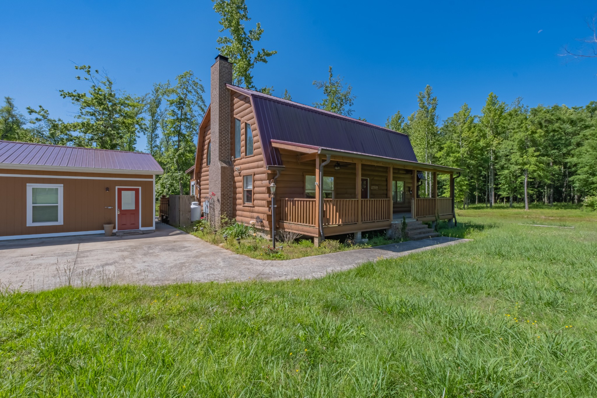 959 Ferrells Loop Road Manchester, TN 37355 - Photo 2 of 55 front view of a house with a yard