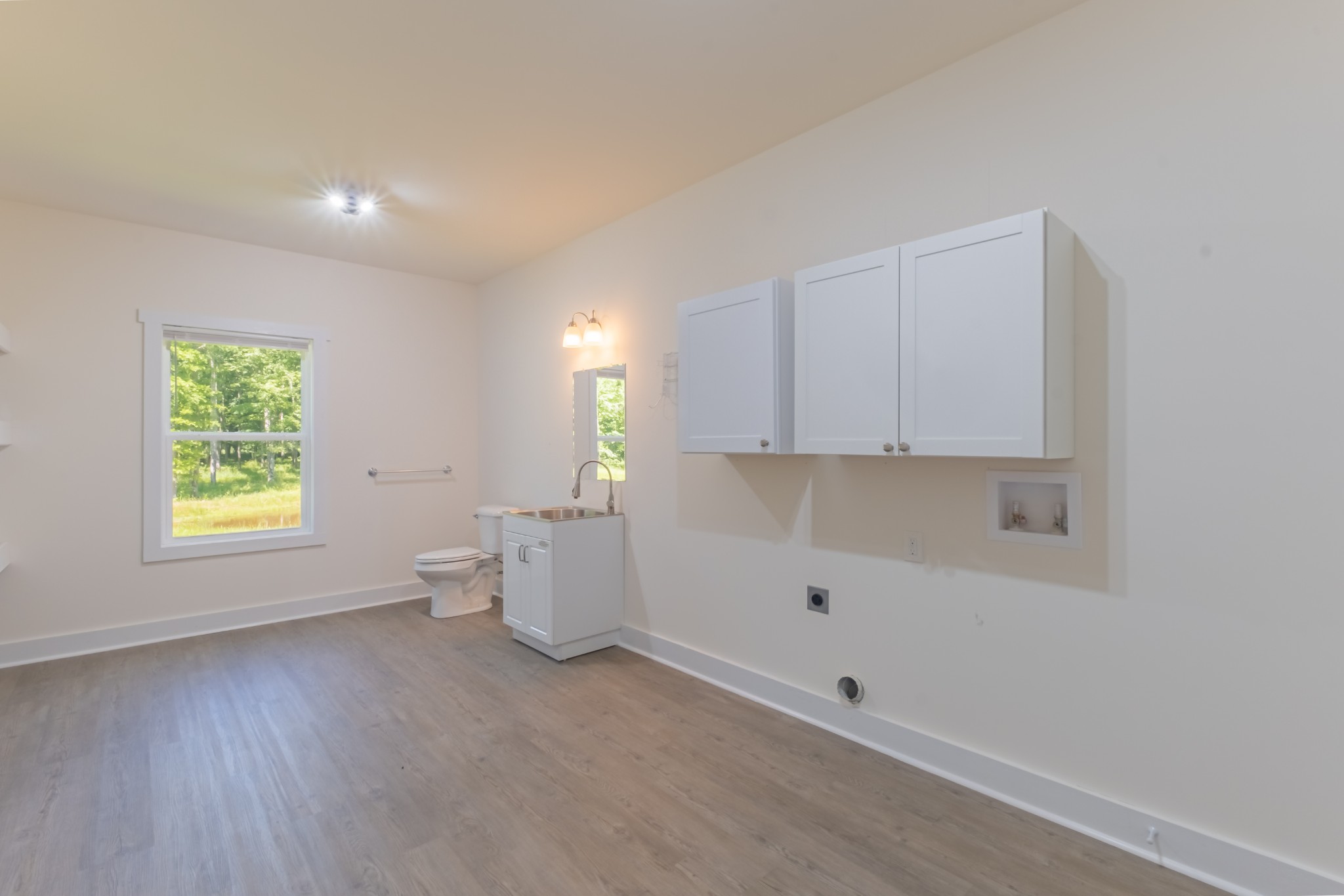 959 Ferrells Loop Road Manchester, TN 37355 - Photo 22 of 55 a view of an empty room with a window