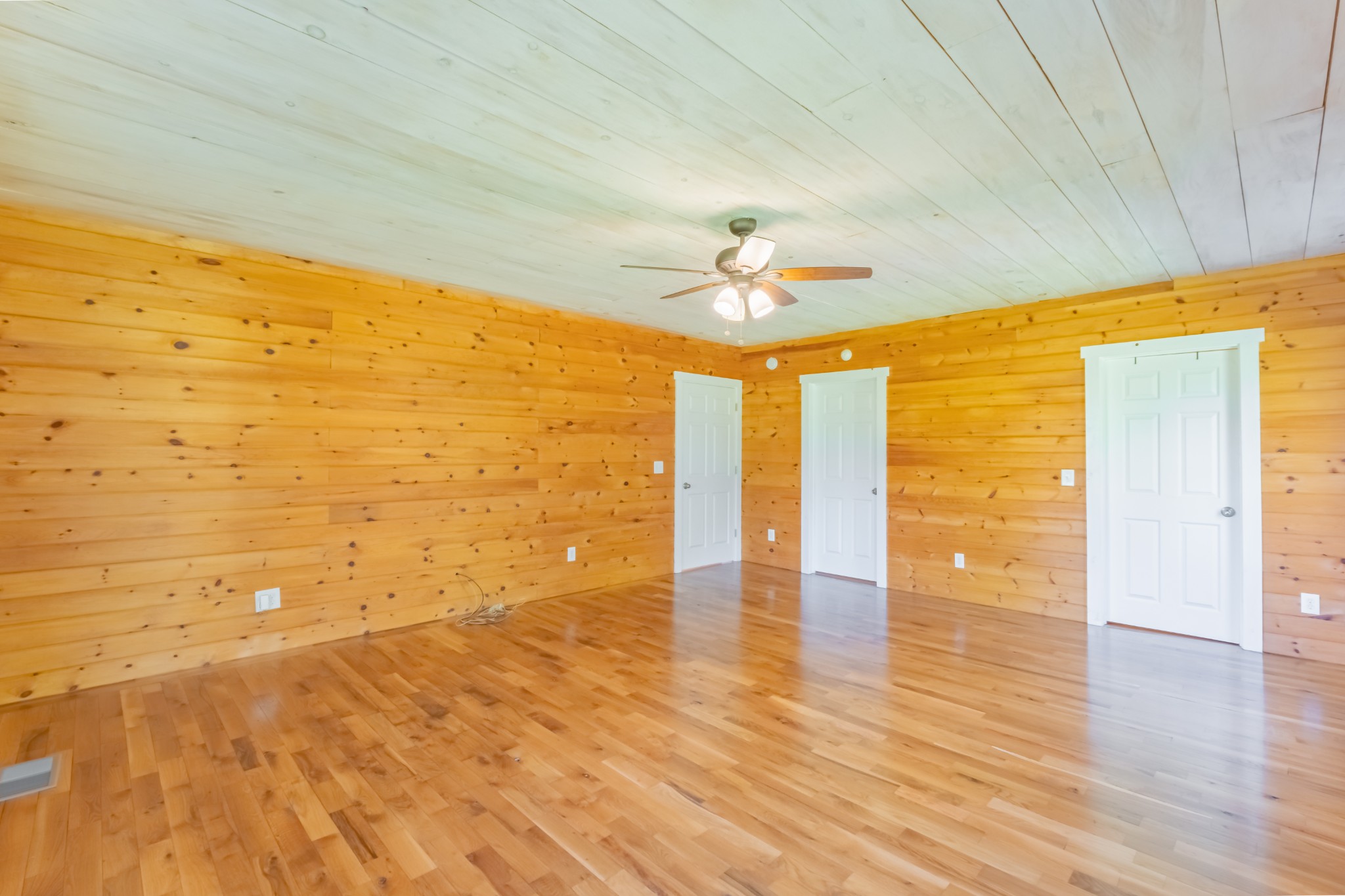 959 Ferrells Loop Road Manchester, TN 37355 - Photo 25 of 55 a view of an empty room with wooden floor
