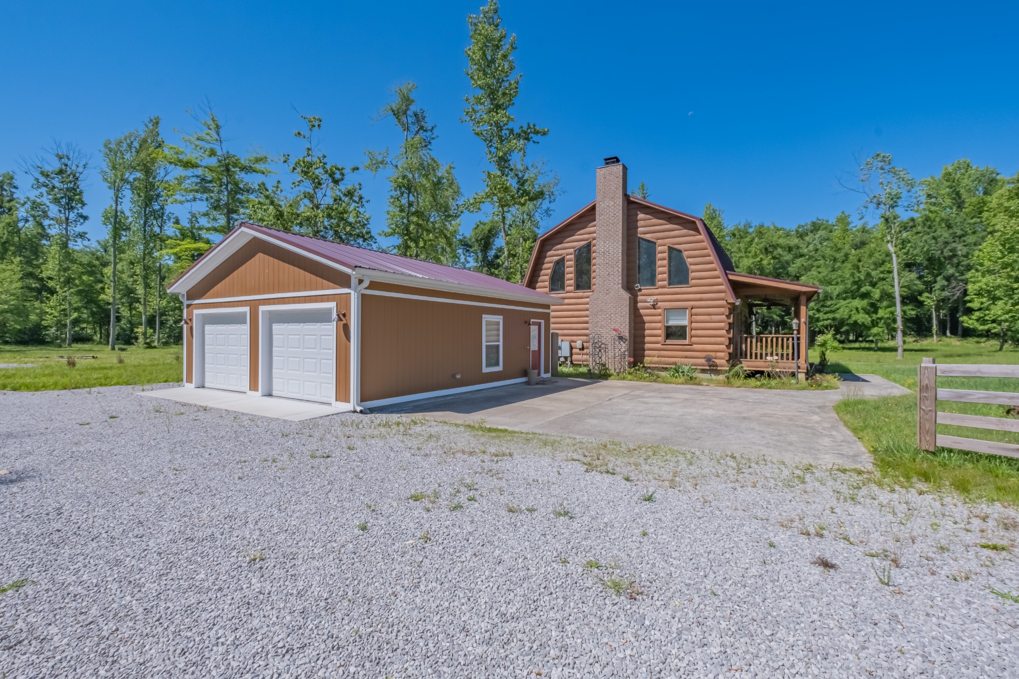 959 Ferrells Loop Road Manchester, TN 37355 - Photo 3 of 55 a house with trees in the background