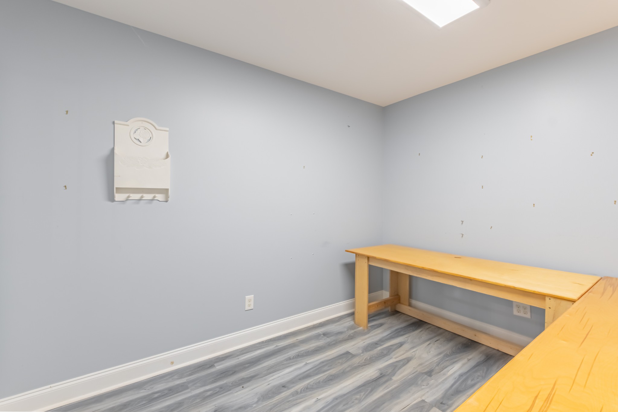 959 Ferrells Loop Road Manchester, TN 37355 - Photo 46 of 55 a room with a wooden floor and a white wall