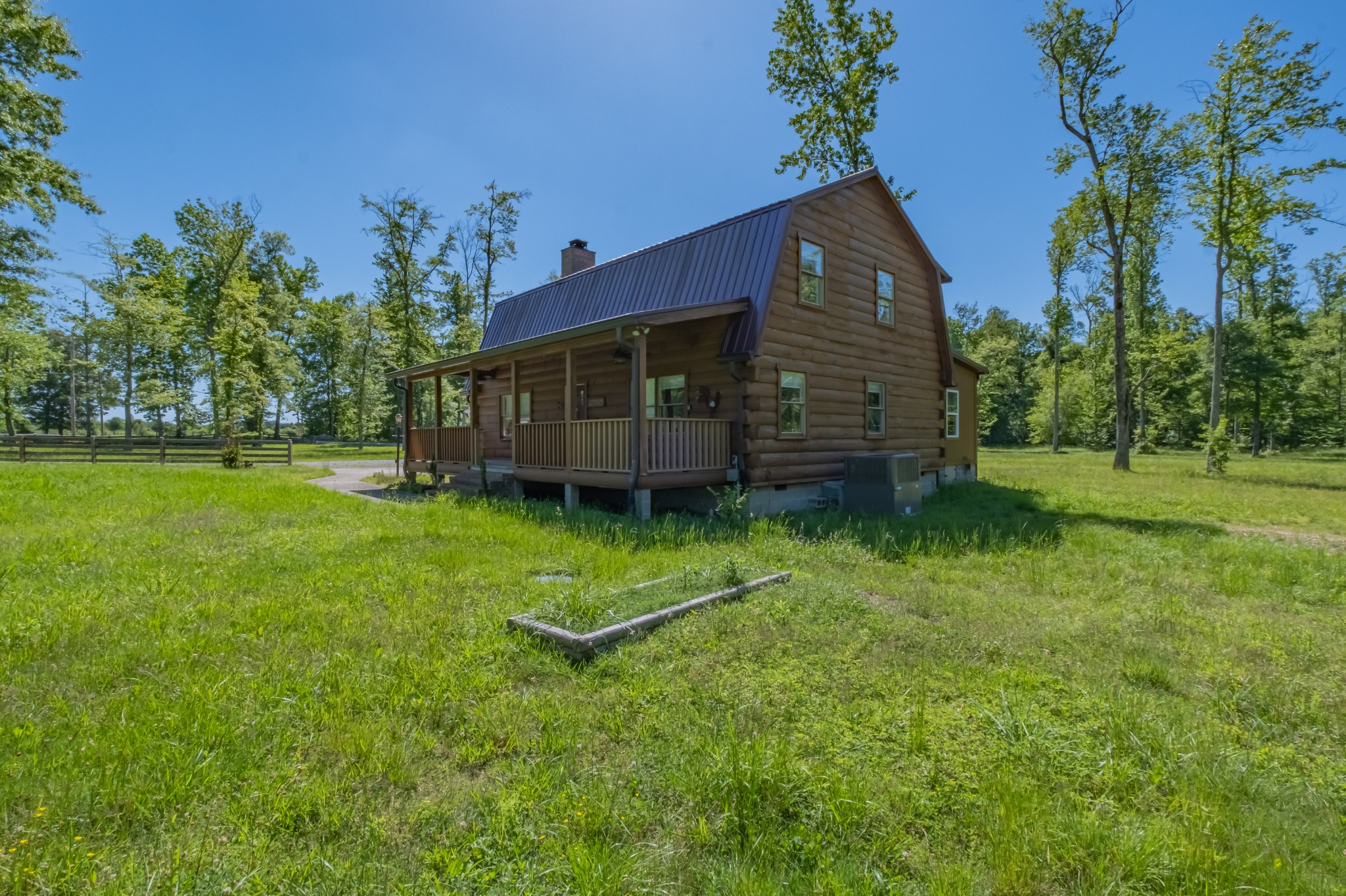 959 Ferrells Loop Road Manchester, TN 37355 - Photo 7 of 55 a house view with a garden space