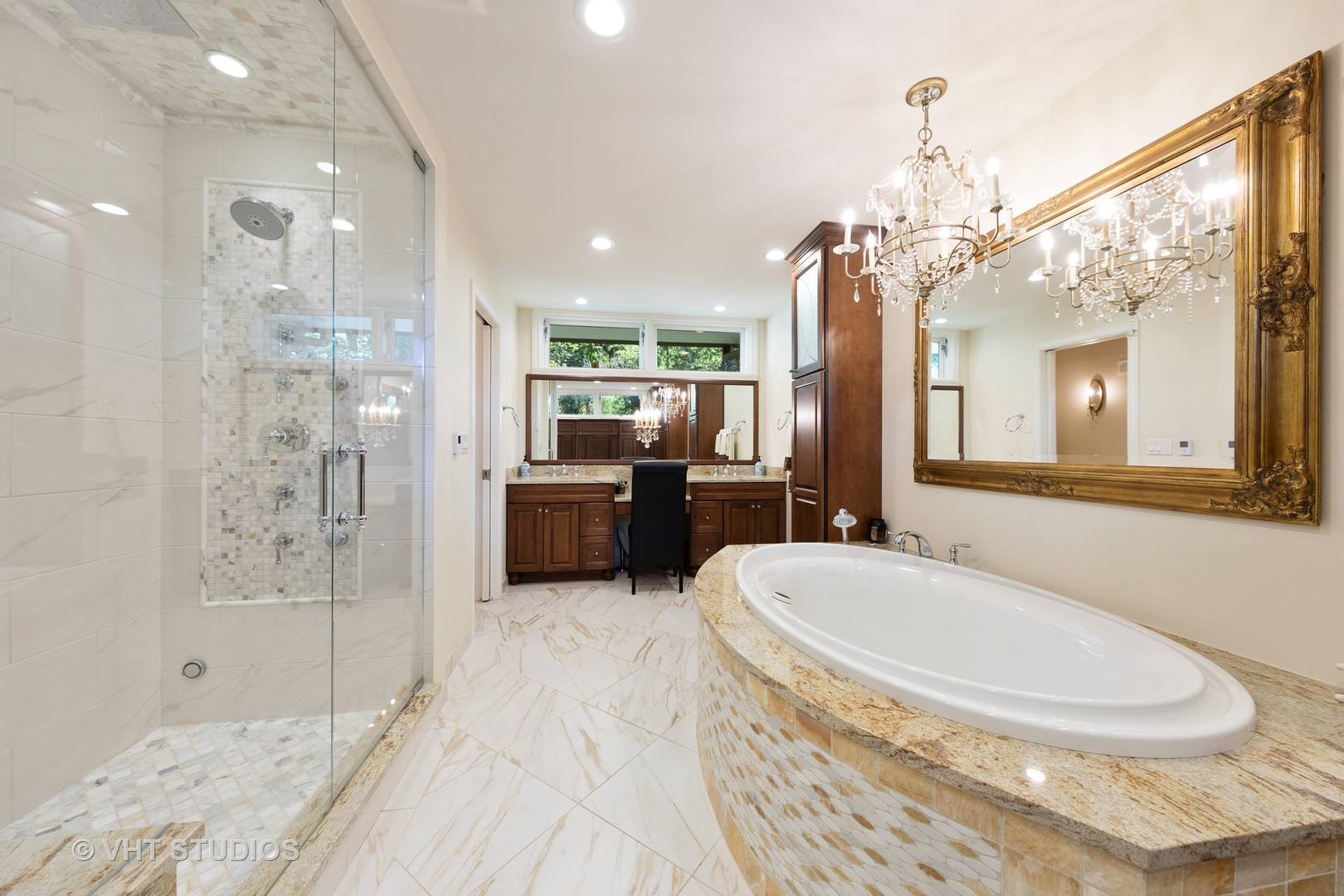 6547 South County Line Road Burr Ridge, IL 60527 - Photo 14 of 59 a bathroom with a tub sink shower and mirror