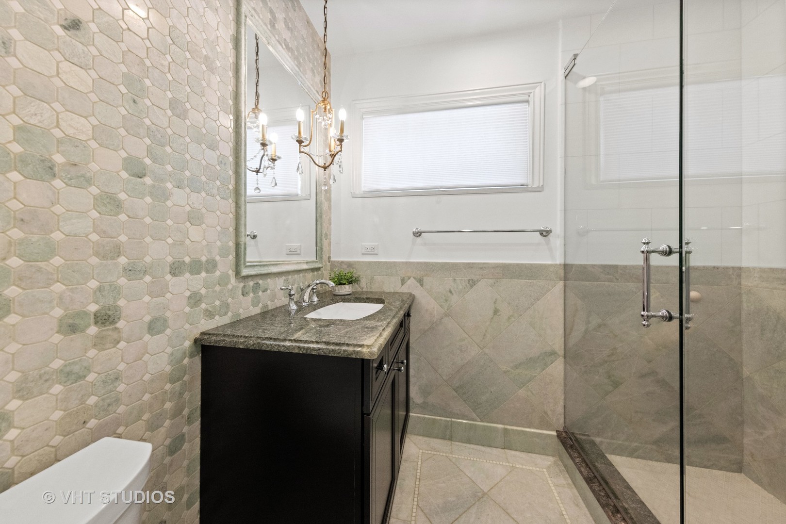 6547 South County Line Road Burr Ridge, IL 60527 - Photo 16 of 59 a bathroom with a granite countertop sink a mirror and shower