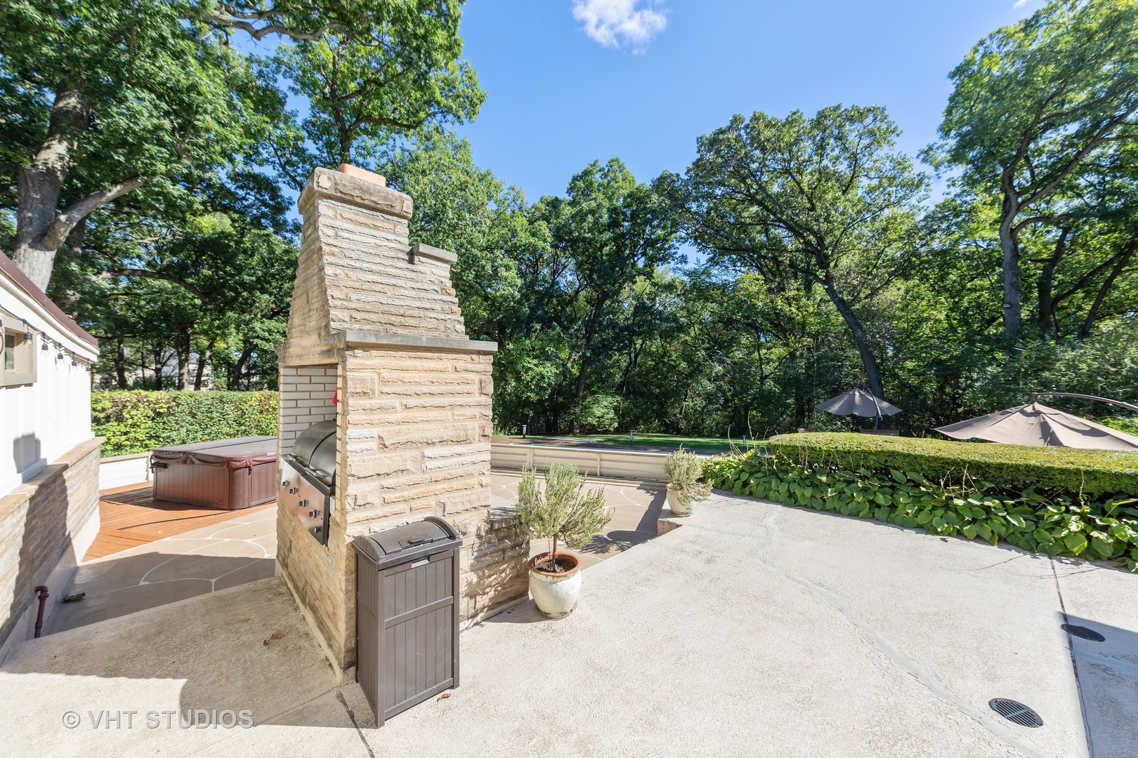 6547 South County Line Road Burr Ridge, IL 60527 - Photo 29 of 59 a view of backyard with outdoor seating and trees