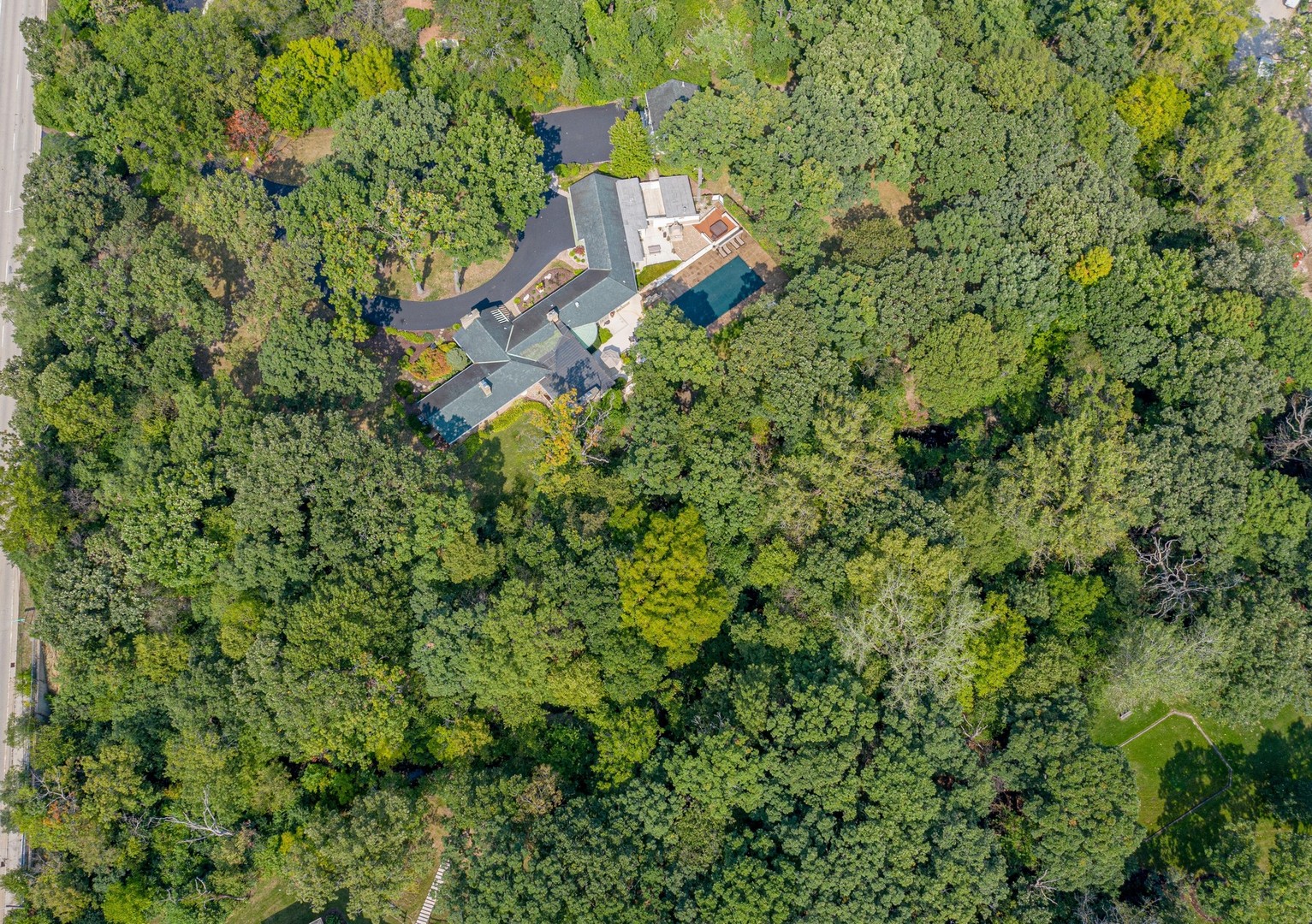 6547 South County Line Road Burr Ridge, IL 60527 - Photo 33 of 59 an aerial view of a house with a yard