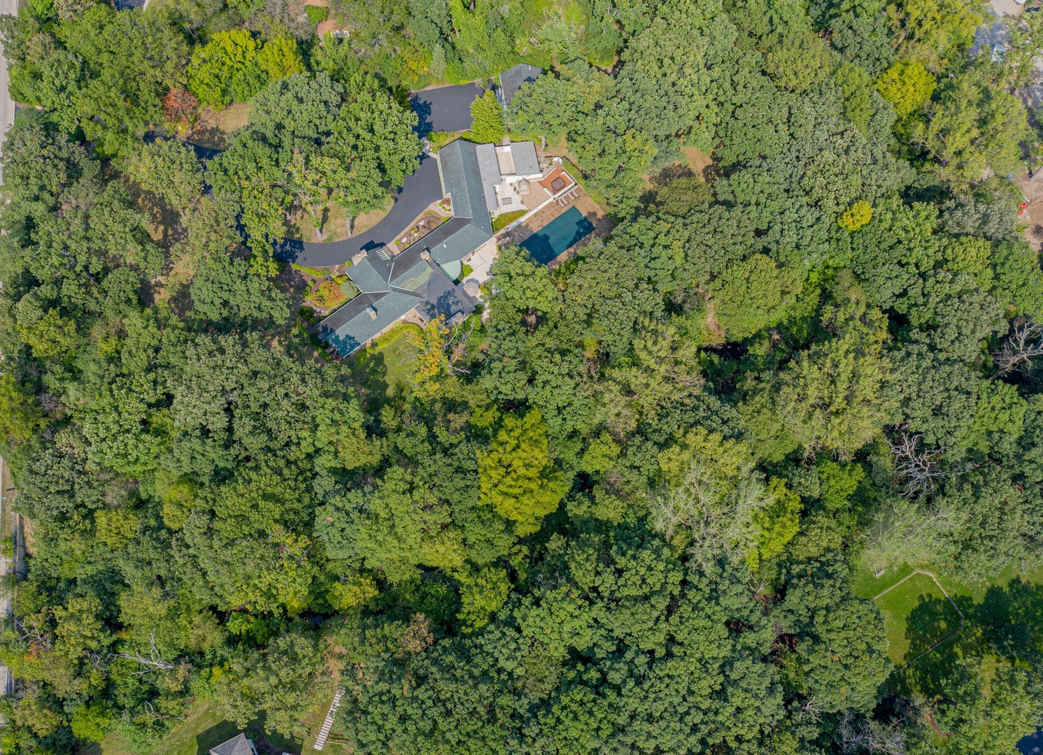 6547 South County Line Road Burr Ridge, IL 60527 - Photo 34 of 59 an aerial view of a house with a yard