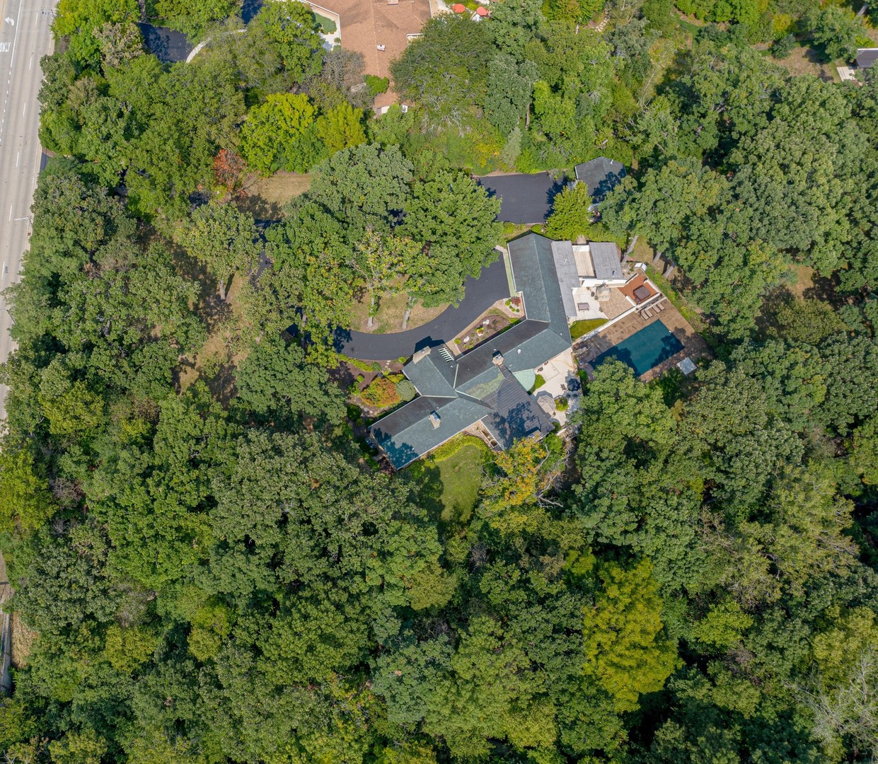 6547 South County Line Road Burr Ridge, IL 60527 - Photo 42 of 59 an aerial view of a house with a yard