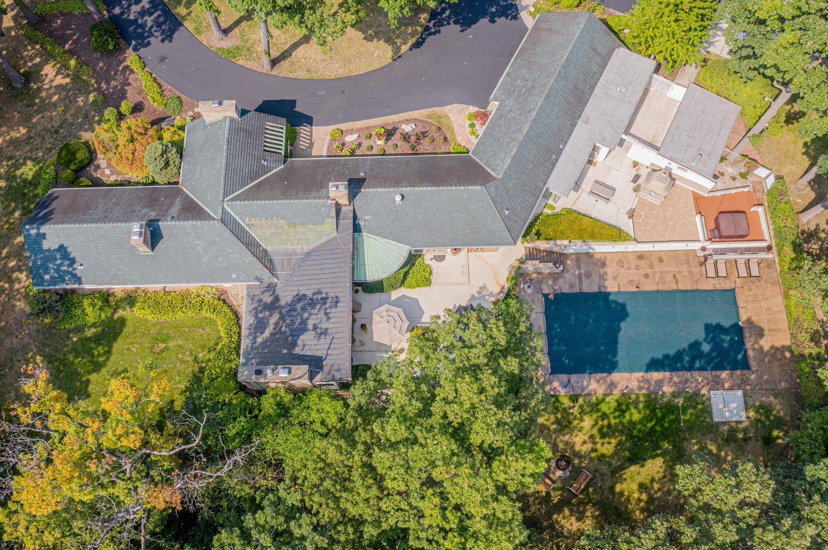 6547 South County Line Road Burr Ridge, IL 60527 - Photo 46 of 59 an aerial view of a house with a swimming pool