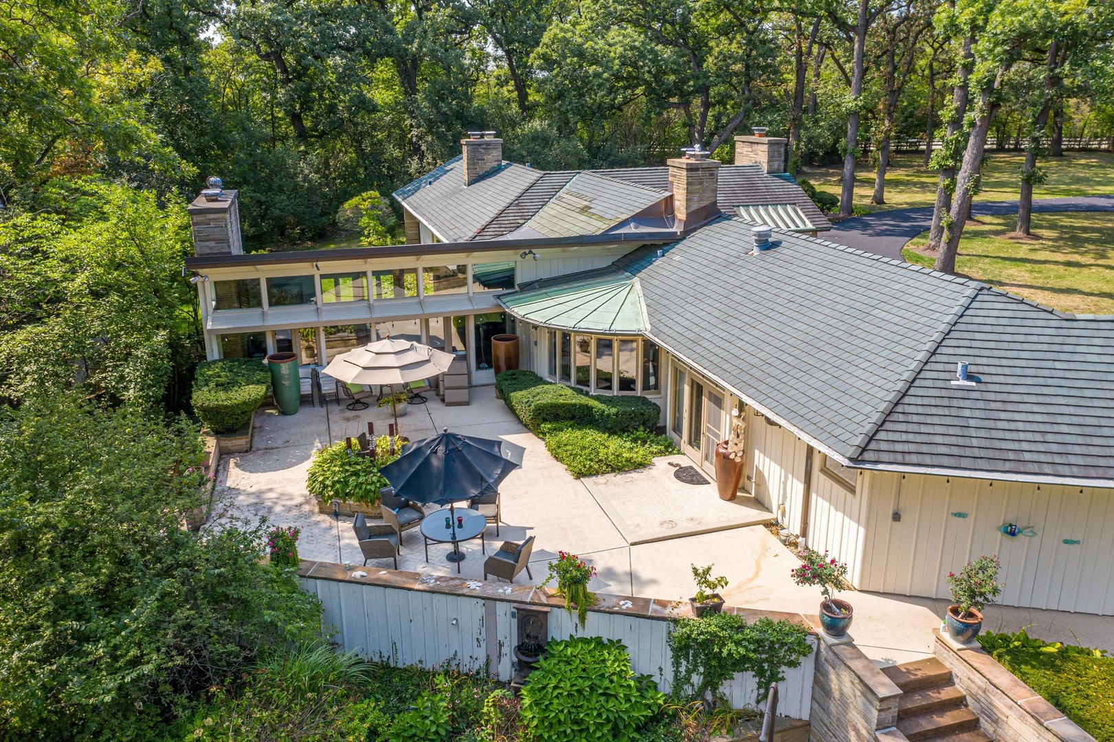 6547 South County Line Road Burr Ridge, IL 60527 - Photo 48 of 59 an aerial view of a house with swimming pool garden and patio