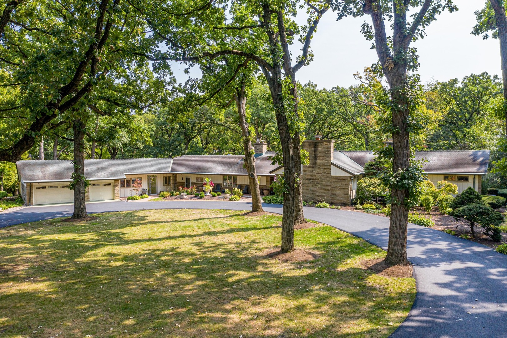 6547 South County Line Road Burr Ridge, IL 60527 - Photo 51 of 59 a view of a house with swimming pool and sitting area
