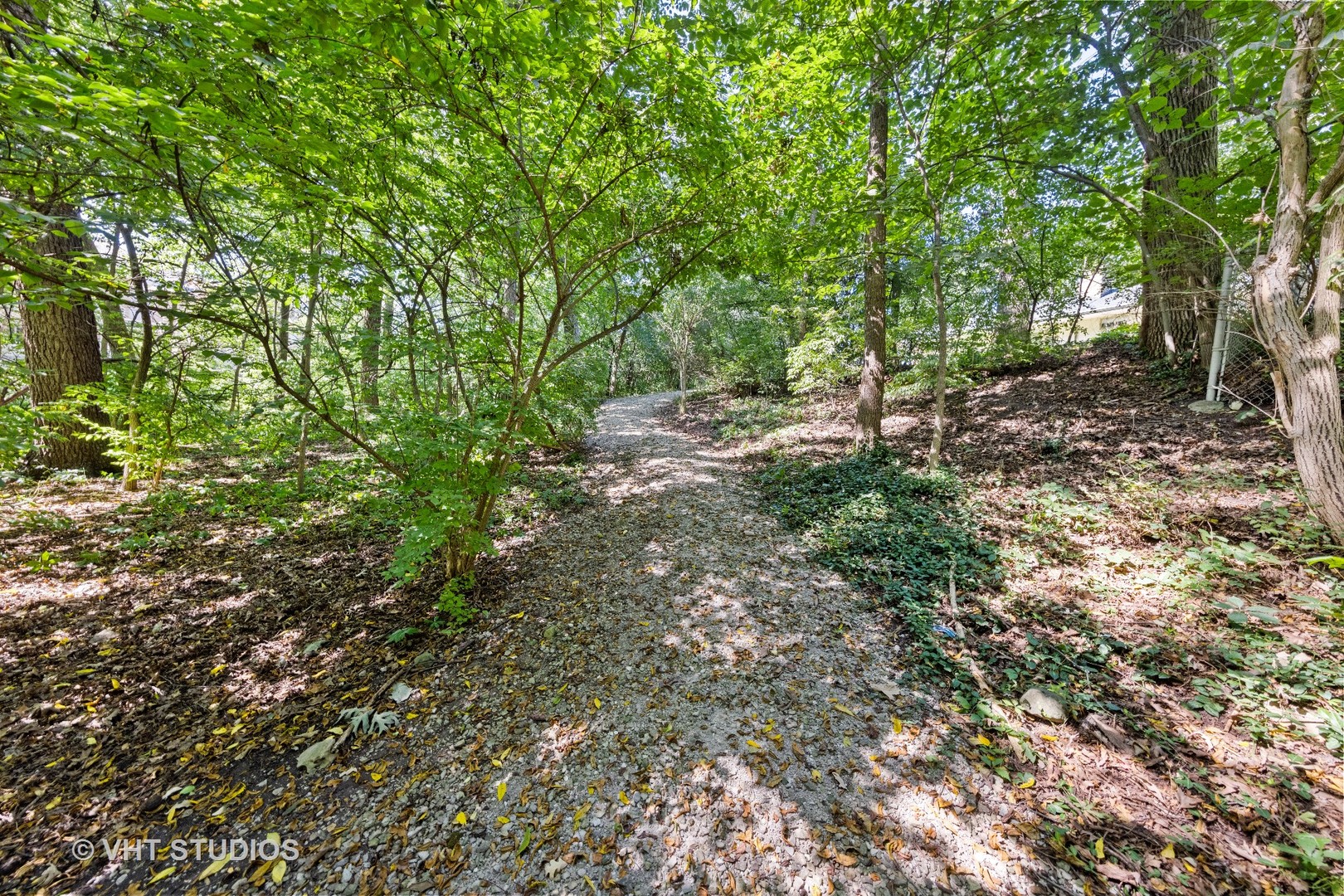 6547 South County Line Road Burr Ridge, IL 60527 - Photo 56 of 59 a backyard of a house with lots of green space