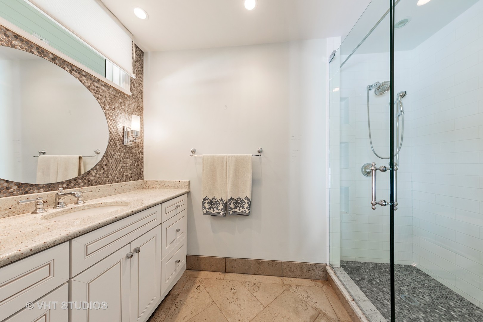 6547 South County Line Road Burr Ridge, IL 60527 - Photo 10 of 59 a bathroom with a granite countertop sink a mirror and a shower