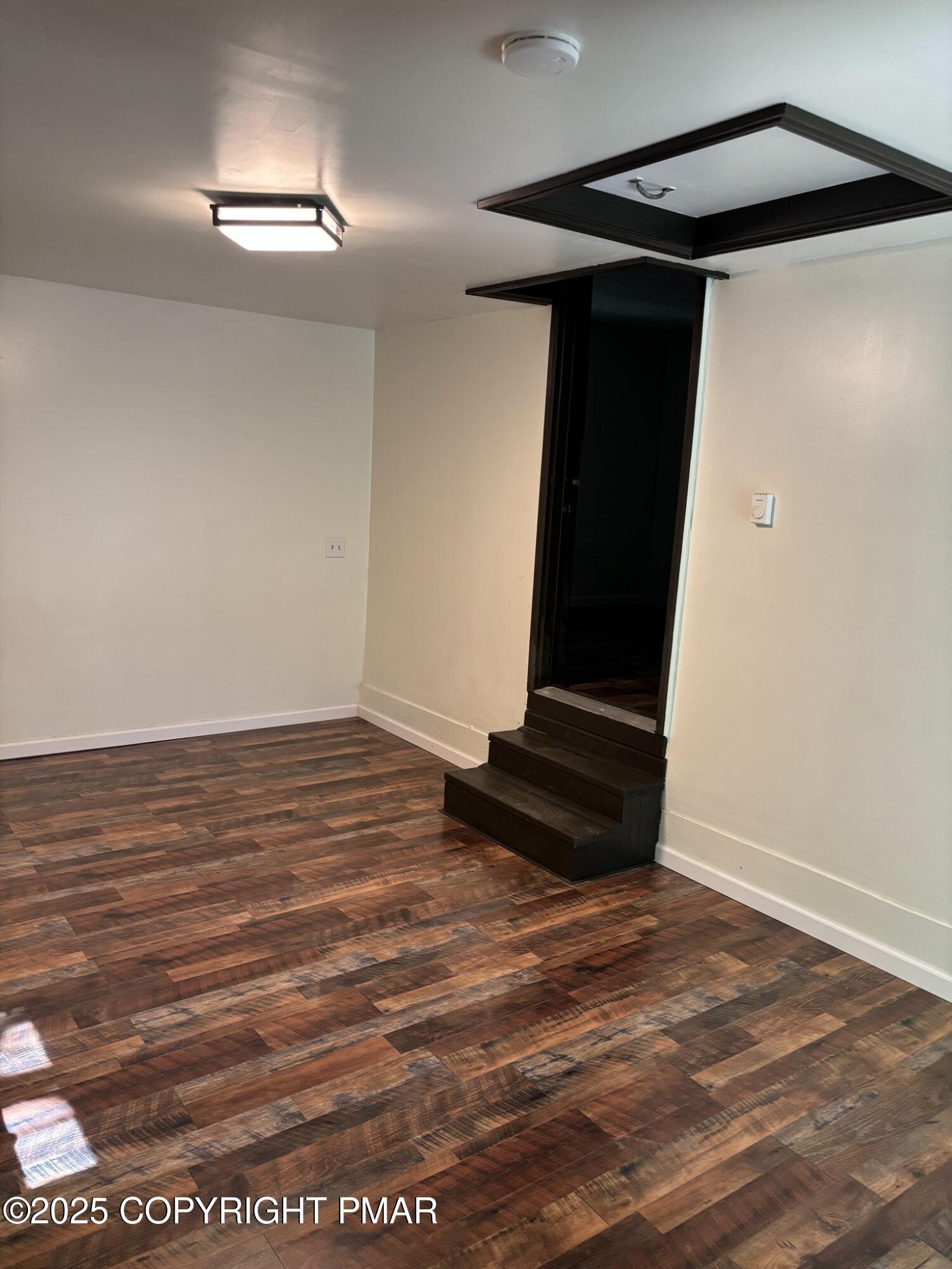 1360 Clover Road North Long Pond, PA 18334 - Photo 21 of 30 a view of an empty room with wooden floor