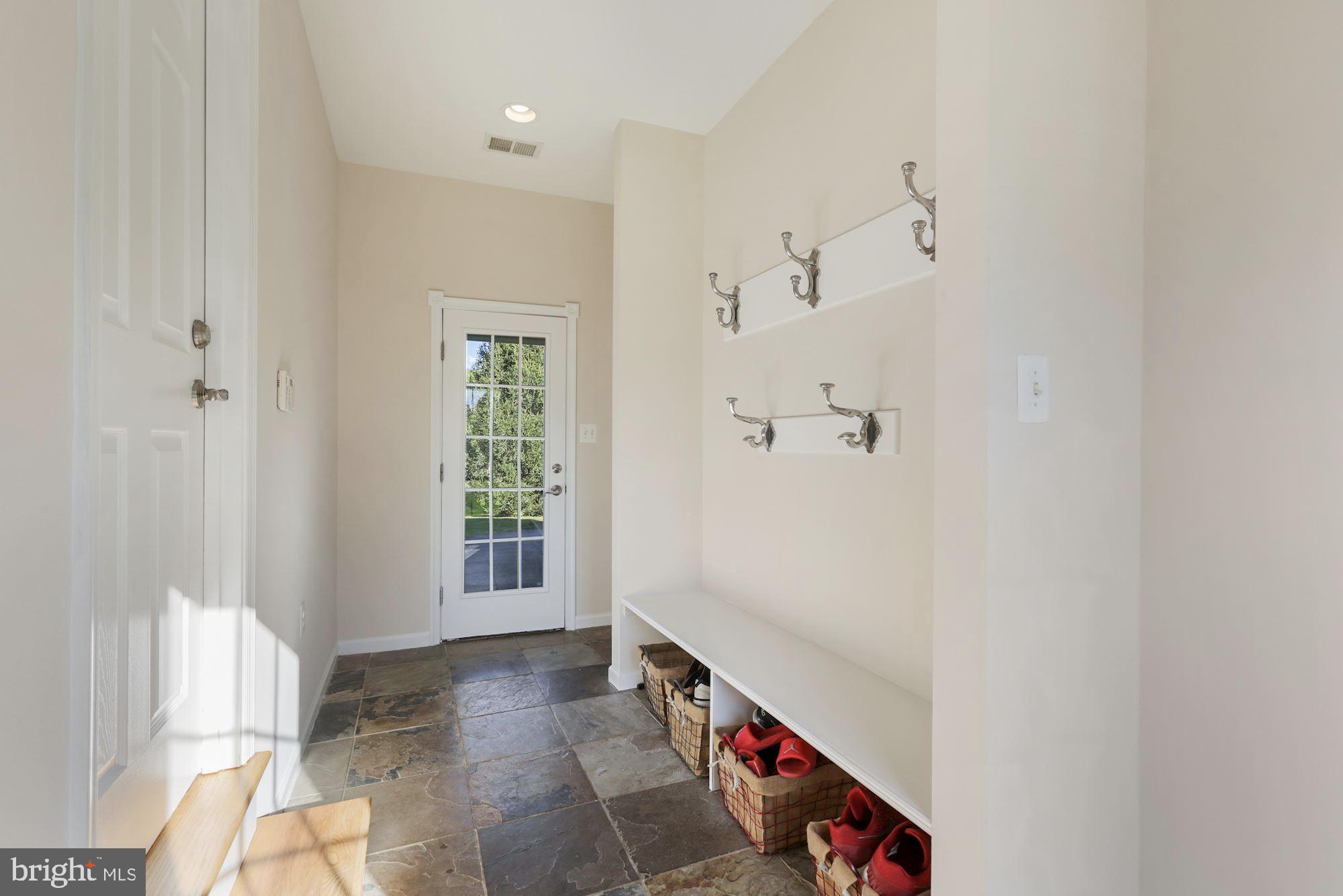 20089 Colchester Road Purcellville, VA 20132 - Photo 25 of 37 Large mud room with separate entry and built ins